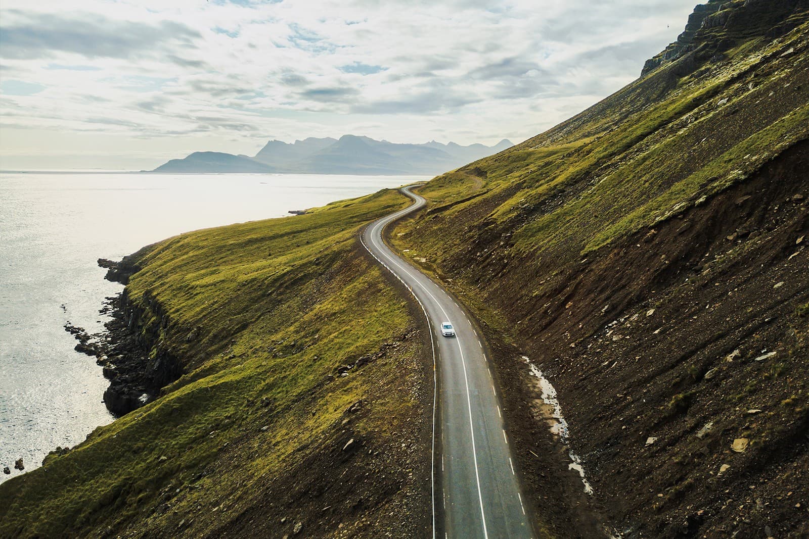 A coastal road winding through the hills